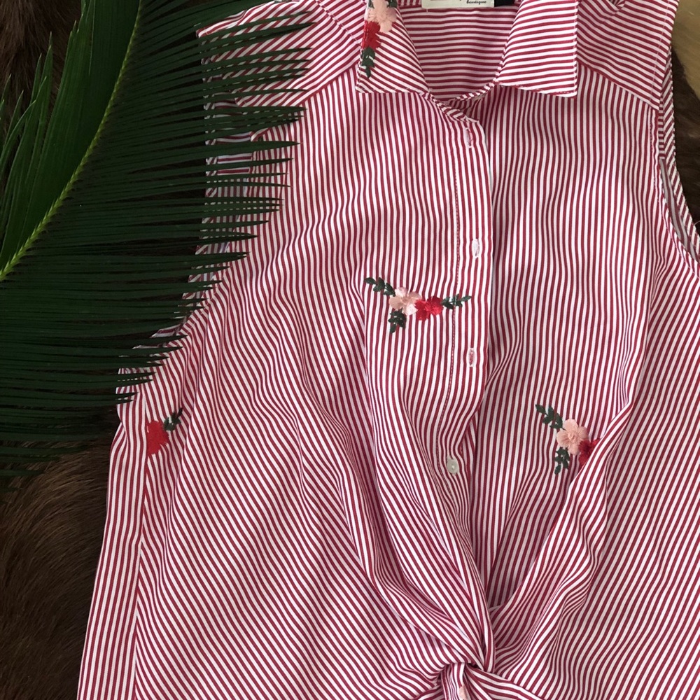 Striped blouse with embroidered details.